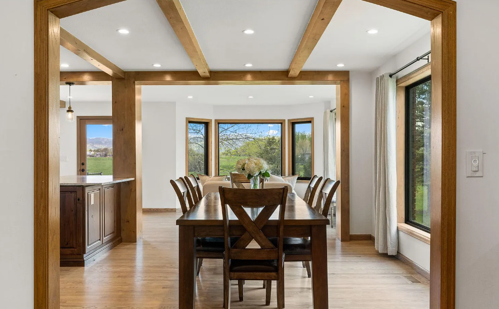 Wood beams and frames featured in a Niwot, Colorado dining room remodel.